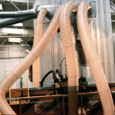 Clear orange hoses coming out of an exhaust system