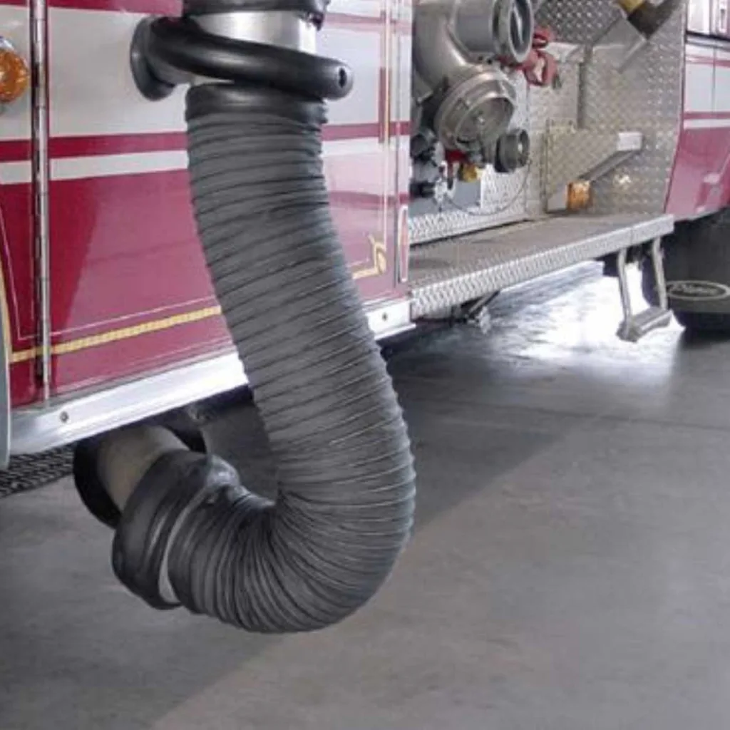 Exhaust hose going into the side of a fire truck